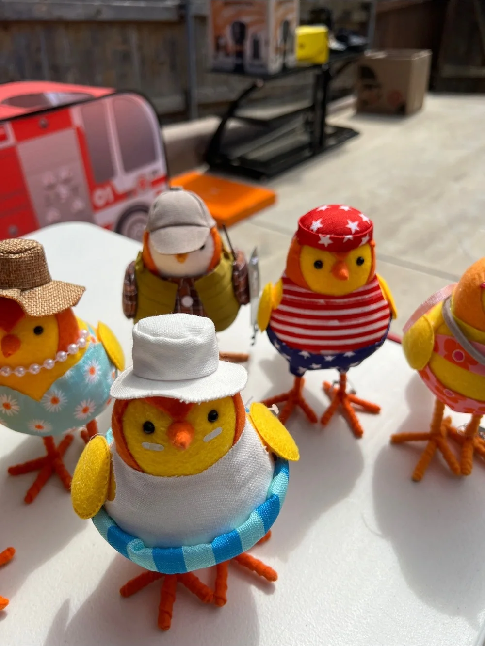Target Plush Chick Figurines in Orange, Red, Yellow and Blue